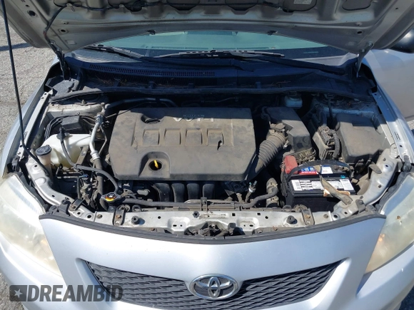 2009 Toyota Corolla with VIN JTDBL40E09J007038, listed as a IAAI auction lot 41830758 with 292,897 mi miles. Bid and sale history available at carsss.com. Image 10.