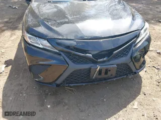 2018 Toyota Camry LE with VIN 4T1B11HK9JU115557, listed as a IAAI auction lot 42087452 with 185,752 mi miles. Bid and sale history available at carsss.com. Image 6.