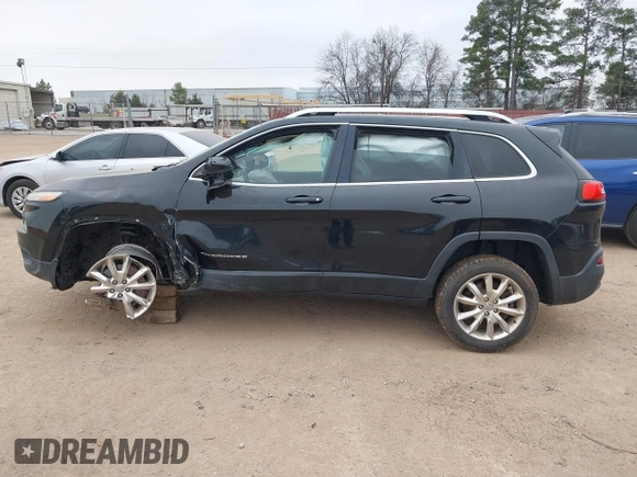 2014 Jeep Cherokee Limited with VIN 1C4PJLDSXEW279356, listed as a IAAI auction lot 41533158 with 115,117 mi miles. Bid and sale history available at carsss.com. Image 15.