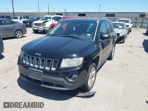 2012 Jeep Compass Sport with VIN 1C4NJCBA9CD684182, listed as a IAAI auction lot 41973857 with 216,722 mi miles. Bid and sale history available at carsss.com. Image 2.