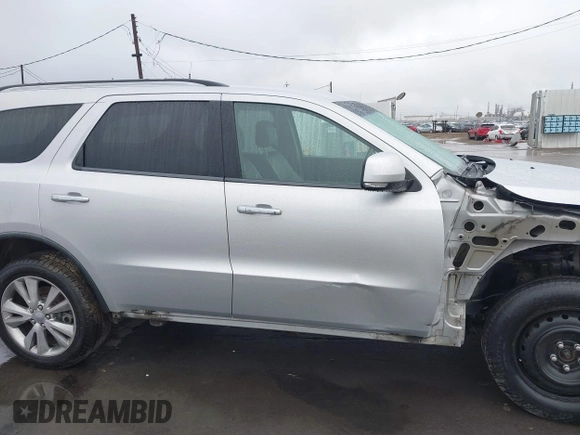 2013 Dodge Durango Crew z VIN 1C4RDJDGXDC637572, wystawiony jako IAAI lot #41922757 z przebiegiem 110 941 mil mil oraz . Historia ofert i sprzedaży dostępna na DreamBid. Obrazek 14.