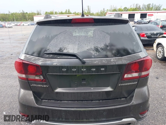2020 Dodge Journey Crossroad with VIN 3C4PDCGB0LT270042, listed as a IAAI auction lot 40521806 with 102,934 mi miles and . Bid and sale history available at carsss.com. Image 16.