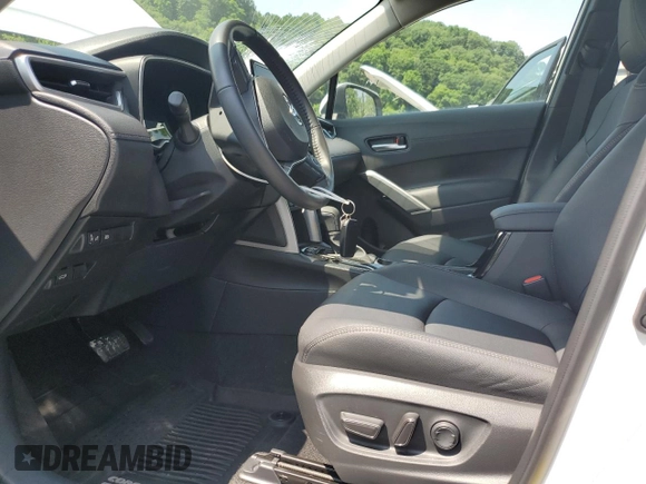 2023 Toyota Corolla Cross XLE with VIN 7MUDAABGXPV060797, listed as a Copart auction lot 62110665 with 18,293 mi miles and Salvage title. Bid and sale history available at DreamBid. Image 7.
