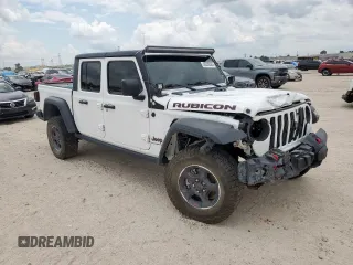 2023 Jeep Gladiator Rubicon with VIN 1C6JJTBG8PL532271, listed as a Copart auction lot 58220565 with 34,172 mi miles and Salvage title. Bid and sale history available at DreamBid. Image 4.