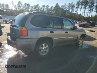 2009 GMC Envoy SLE with VIN 1GKDS33SX92131159, listed as a Copart auction lot 82487404 with 224,391 mi miles and Salvage Title. Bid and sale history available at carsss.com. Image 3.