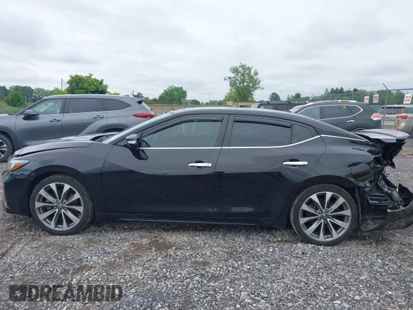 2021 Nissan Maxima Platinum with VIN 1N4AA6FVXMC516268, listed as a IAAI auction lot 42591233 with 138,647 mi miles and . Bid and sale history available at DreamBid. Image 14.