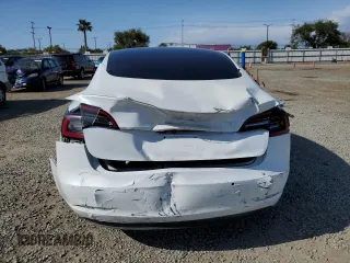 2021 Tesla Model 3 Standard Range Plus with VIN 5YJ3E1EA0MF072457, listed as a Copart auction lot 51666135 with 32,534 mi miles and Salvage Title. Bid and sale history available at carsss.com. Image 6.
