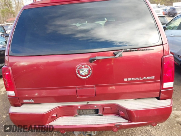 2003 Cadillac Escalade z VIN 1GYEC63T53R146068, wystawiony jako IAAI lot #41634405 z przebiegiem 272 263 mil mil oraz . Historia ofert i sprzedaży dostępna na DreamBid. Obrazek 16.
