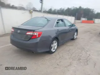 2014 Toyota Camry L with VIN 4T1BF1FKXEU813606, listed as a IAAI auction lot 41528889 with 252,866 mi miles. Bid and sale history available at carsss.com. Image 4.