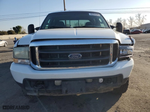 2004 Ford Super Duty F-250 XL with VIN 1FTNW21P94EB80311, listed as a Copart auction lot 43791515 with 254,082 mi miles and Salvage Title. Bid and sale history available at carsss.com. Image 5.