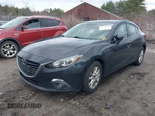 2015 Mazda Mazda3 i Touring with VIN JM1BM1V77F1226189, listed as a IAAI auction lot 41838696 with 146,764 mi miles. Bid and sale history available at carsss.com. Image 2.