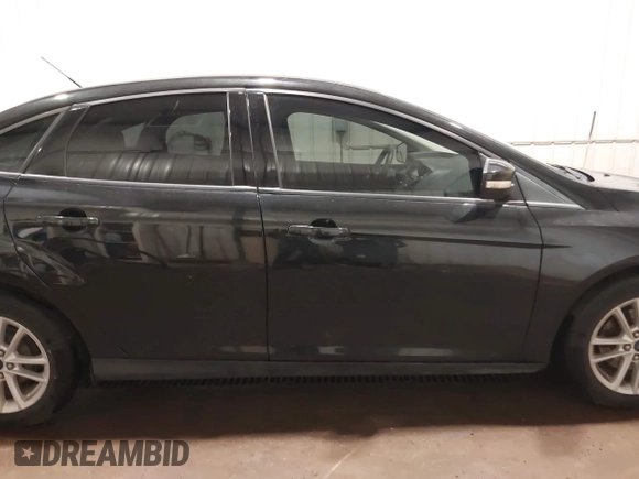 2015 Ford Focus SE with VIN 1FADP3F29FL203084, listed as a IAAI auction lot 42357973 with 99,002 mi miles and . Bid and sale history available at DreamBid. Image 13.