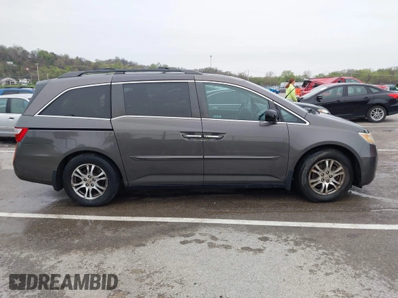 2012 Honda Odyssey EX-L with VIN 5FNRL5H6XCB032366, listed as a IAAI auction lot 41943625 with 73,236 mi miles and . Bid and sale history available at carsss.com. Image 13.