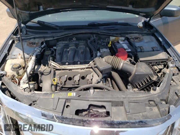 2012 Ford Fusion SEL z VIN 3FAHP0JG7CR332022, wystawiony jako Copart lot #60785765 z przebiegiem 112 202 mil mil oraz Szkoda całkowita • Salvage title. Historia ofert i sprzedaży dostępna na DreamBid. Obrazek 11.