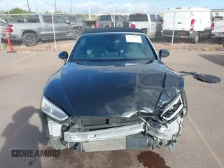 2018 Audi A5 Cabriolet Premium Plus z VIN WAUYNGF54JN008779, wystawiony jako IAAI lot #40763875 z przebiegiem 53 346 mil mil oraz . Historia ofert i sprzedaży dostępna na DreamBid. Obrazek 13.