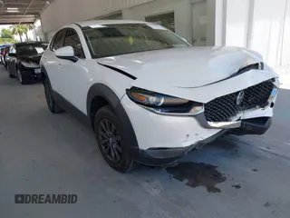 2021 Mazda CX-30 S with VIN 3MVDMAAL8MM211999, listed as a IAAI auction lot 42523364 with 56,044 mi miles and . Bid and sale history available at DreamBid. Image 1.