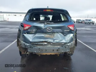 2015 Mazda CX-5 Sport with VIN JM3KE4BY0F0507727, listed as a IAAI auction lot 41249151 with 95,343 mi miles. Bid and sale history available at carsss.com. Image 17.