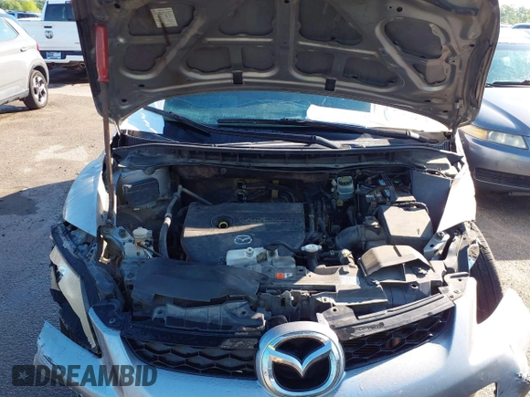 2011 Mazda CX-7 i Sport z VIN JM3ER2B55B0389115, wystawiony jako IAAI lot #42178894 z przebiegiem 237 552 mil mil oraz . Historia ofert i sprzedaży dostępna na DreamBid. Obrazek 10.
