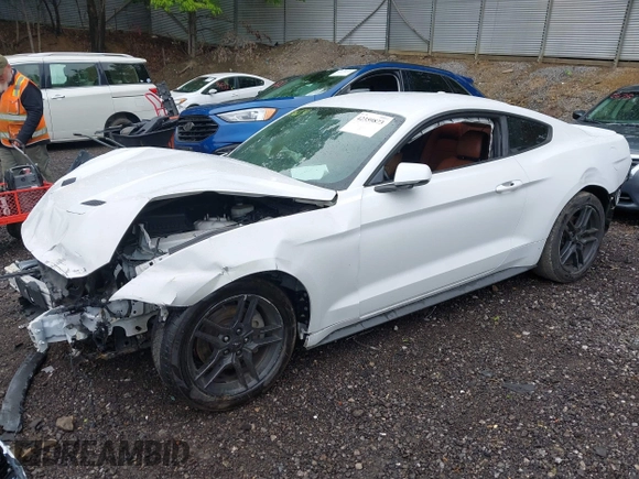 2018 Ford Mustang EcoBoost z VIN 1FA6P8TH2J5184938, wystawiony jako IAAI lot #42359873 z przebiegiem 80 965 mil mil oraz . Historia ofert i sprzedaży dostępna na DreamBid. Obrazek 21.