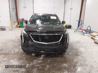 2020 Cadillac XT4 AWD Sport with VIN 1GYFZFR43LF090264, listed as a IAAI auction lot 41261586 with 65,859 mi miles and . Bid and sale history available at DreamBid. Image 12.