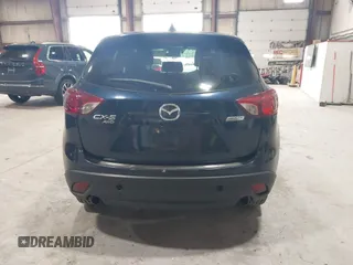 2015 Mazda CX-5 Grand Touring z VIN JM3KE4DYXF0490920, wystawiony jako IAAI lot #42367194 z przebiegiem 80 436 mil mil oraz . Historia ofert i sprzedaży dostępna na DreamBid. Obrazek 16.