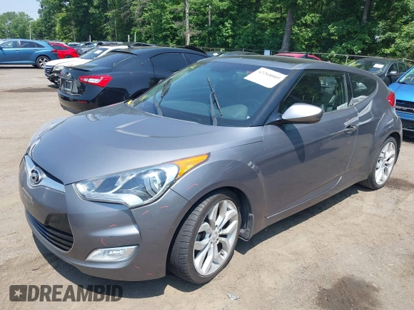 2013 Hyundai Veloster w/Gray Int with VIN KMHTC6AD5DU132237, listed as a IAAI auction lot 42268005 with 84,646 mi miles and . Bid and sale history available at DreamBid. Image 2.