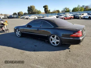2002 Mercedes-Benz CL with VIN WDBPJ75J32A023824, listed as a Copart auction lot 77254134 with 187,807 mi miles and Salvage Title. Bid and sale history available at carsss.com. Image 2.
