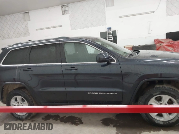 2014 Jeep Grand Cherokee Laredo with VIN 1C4RJFAG4EC186926, listed as a IAAI auction lot 41745168 with 128,519 mi miles. Bid and sale history available at carsss.com. Image 13.