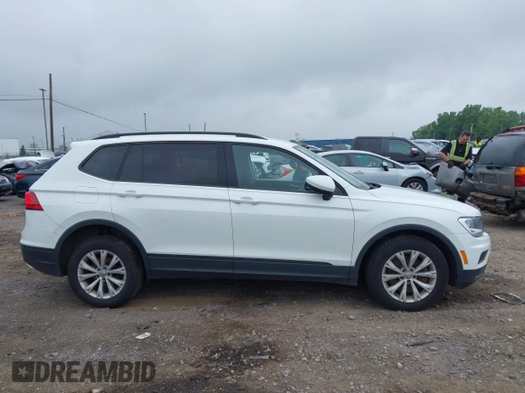 2020 Volkswagen Tiguan S with VIN 3VV0B7AX0LM140910, listed as a IAAI auction lot 42622385 with 80,998 mi miles and . Bid and sale history available at DreamBid. Image 13.