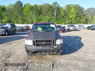 2004 Ford Explorer Sport Trac XLS z VIN 1FMZU67K64UC21974, wystawiony jako IAAI lot #42017439 z przebiegiem 193 613 mil mil oraz . Historia ofert i sprzedaży dostępna na DreamBid. Obrazek 6.