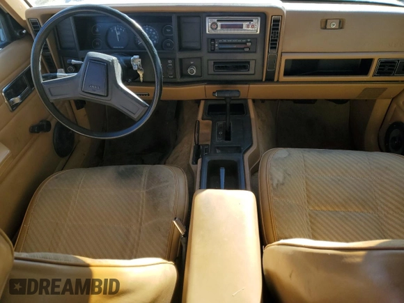 1988 Jeep Cherokee with VIN 1JCMR7813JT058390, listed as a Copart auction lot 89071925 with 2,331,297 mi miles and Clean title. Bid and sale history available at DreamBid. Image 8.