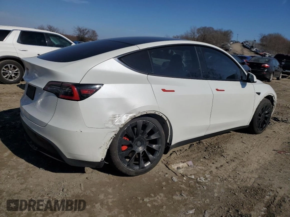 2020 Tesla Model Y Long Range with VIN 5YJYGDEE2LF041925, listed as a Copart auction lot 47092675 with 75,871 mi miles and Salvage Title. Bid and sale history available at DreamBid. Image 3.