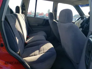 1998 Jeep Grand Cherokee Laredo with VIN 1J4GZ58S3WC245142, listed as a Copart auction lot 79434534 with 276,971 mi miles and Salvage Title. Bid and sale history available at carsss.com. Image 10.