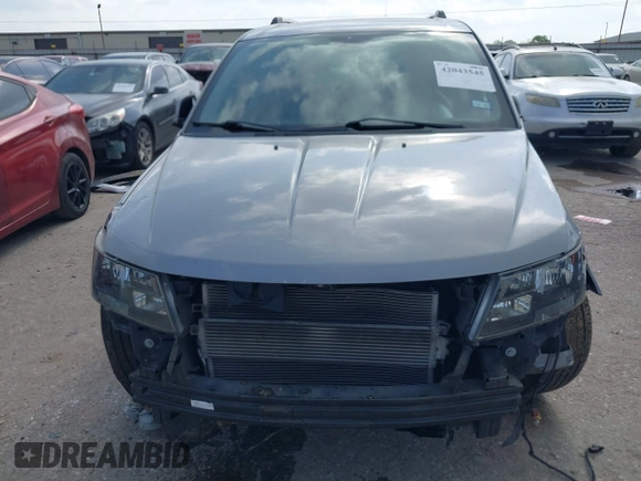 2016 Dodge Journey Crossroad Plus z VIN 3C4PDCGB0GT131602, wystawiony jako IAAI lot #42043545 z przebiegiem 102 225 mil mil oraz . Historia ofert i sprzedaży dostępna na DreamBid. Obrazek 6.
