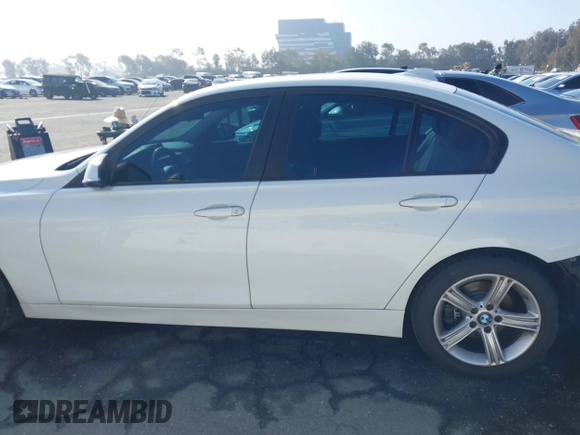 2014 BMW 3 Series 328i with VIN WBA3A5C52EJ463819, listed as a IAAI auction lot 41669717 with 111,112 mi miles. Bid and sale history available at carsss.com. Image 15.