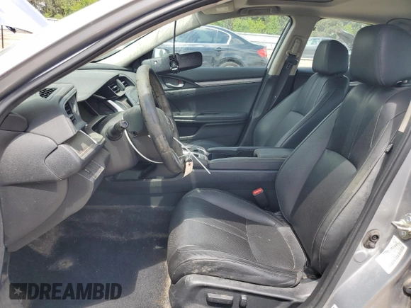 2016 Honda Civic EX-L z VIN 19XFC1F77GE038287, wystawiony jako Copart lot #58937695 z przebiegiem 146 025 mil mil oraz Szkoda całkowita • Salvage title. Historia ofert i sprzedaży dostępna na DreamBid. Obrazek 7.