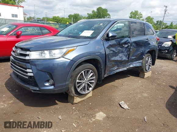 2019 Toyota Highlander SE with VIN 5TDJZRFH2KS975689, listed as a IAAI auction lot 42250723 with 88,043 mi miles and . Bid and sale history available at DreamBid. Image 17.