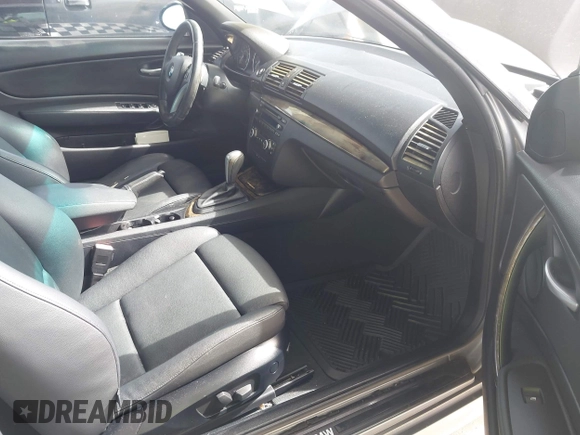 2009 BMW 1 Series 128i with VIN WBAUL73509VJ75662, listed as a IAAI auction lot 42639936 with 96,542 mi miles and . Bid and sale history available at DreamBid. Image 5.