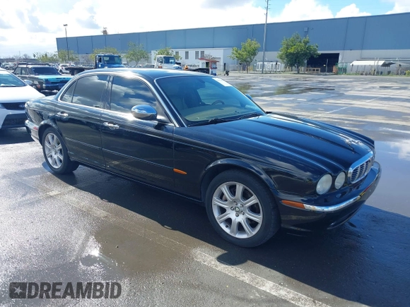 2004 Jaguar XJ with VIN SAJEA74C94SG11224, listed as a IAAI auction lot 41732975 with 204,815 mi miles and . Bid and sale history available at DreamBid. Image 1.
