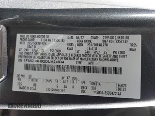 2013 Ford Escape SEL with VIN 1FMCU9H92DUA24934, listed as a IAAI auction lot 41832566 with 124,705 mi miles. Bid and sale history available at carsss.com. Image 9.