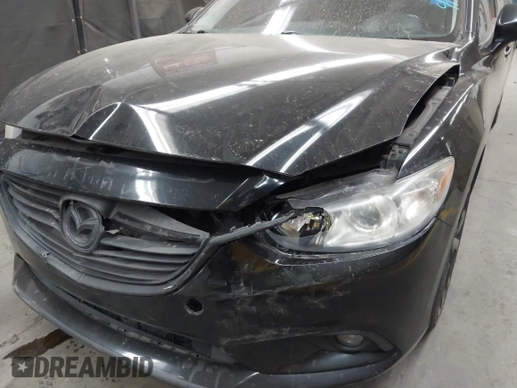 2014 Mazda Mazda6 i Touring with VIN JM1GJ1T67E1125290, listed as a IAAI auction lot 42041112 with 114,875 mi miles. Bid and sale history available at carsss.com. Image 6.