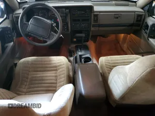1995 Jeep Grand Cherokee Laredo with VIN 1J4GZ58Y5SC565187, listed as a Copart auction lot 45179985 with 122,863 mi miles and Salvage Title. Bid and sale history available at carsss.com. Image 8.