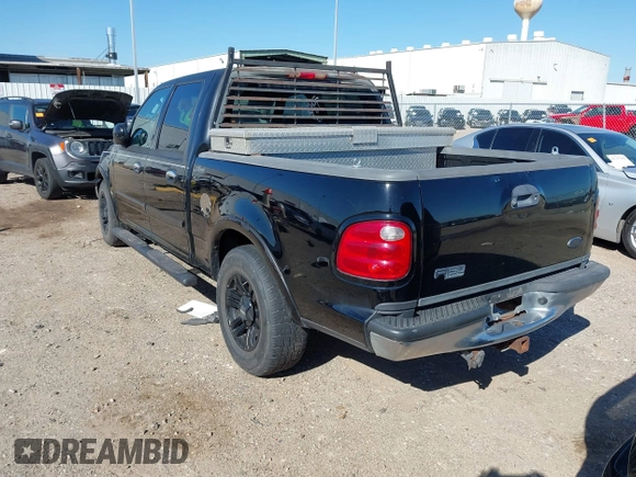 2003 Ford F-150 XLT with VIN 1FTRW07L43KB05221, listed as a IAAI auction lot 41762332 with 226,660 mi miles. Bid and sale history available at carsss.com. Image 3.