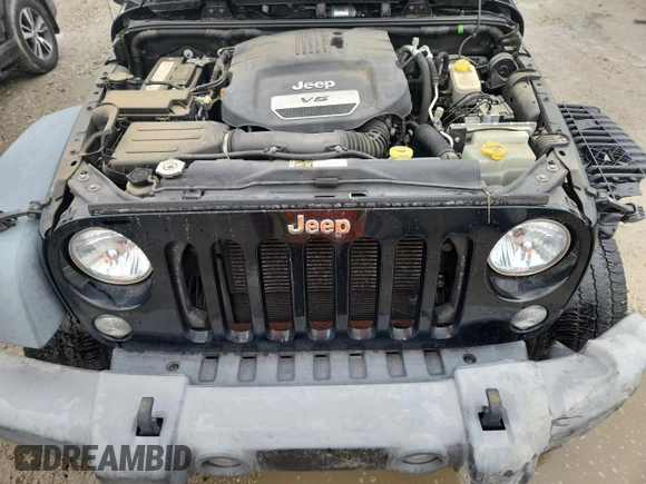2016 Jeep Wrangler Willys Wheeler with VIN 1C4GJWAG6GL326498, listed as a Copart auction lot 62849715 with 49,414 mi miles and Salvage title. Bid and sale history available at DreamBid. Image 12.