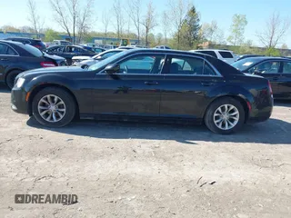 2018 Chrysler 300 Touring with VIN 2C3CCAAG2JH320573, listed as a IAAI auction lot 42134350 with 90,929 mi miles and . Bid and sale history available at DreamBid. Image 14.
