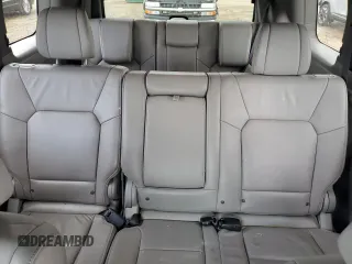 2013 Honda Pilot Touring z VIN 5FNYF4H91DB062722, wystawiony jako Copart lot #58308165 z przebiegiem 130 896 mil mil oraz Szkoda całkowita • Salvage title. Historia ofert i sprzedaży dostępna na DreamBid. Obrazek 10.