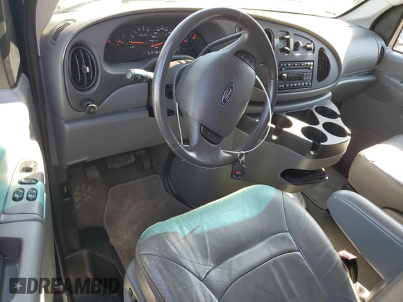 2008 Ford Econoline Passenger XL with VIN 1FMNE11L48DA51670, listed as a Copart auction lot 77653154 with 124,127 mi miles and Salvage title. Bid and sale history available at DreamBid. Image 8.