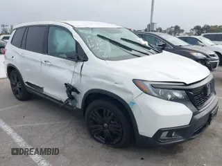 2021 Honda Passport Sport with VIN 5FNYF7H23MB002946, listed as a IAAI auction lot 41074504 with 46,882 mi miles and . Bid and sale history available at DreamBid. Image 1.