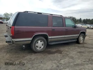 1999 Chevrolet Suburban z VIN 1GNFK16R2XJ328550, wystawiony jako Copart lot #53179525 z przebiegiem 170 914 mil mil oraz Czysty tytuł • Clean title. Historia ofert i sprzedaży dostępna na DreamBid. Obrazek 3.