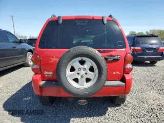 2002 Jeep Liberty Limited with VIN 1J8GL58K42W328443, listed as a Copart auction lot 52768345 with 218,459 mi miles and Salvage title. Bid and sale history available at DreamBid. Image 6.